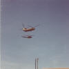 (51)  Huey being sling-loaded