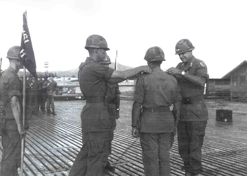 I think these three images is the Change of Command Ceremony when Carroll Issacs was promoted from 161st Co to 14th Battalion Commander.  1st Sgt Oakley is on the left pinning the Green Leadership tabs.