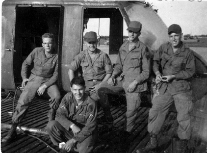 Tom's maintenance team.  (L-R) This may be Stephen Freeman, Tom Cope, Lewis Bader, Howard Clayburn. Kneeling:  Gary Geisinger.  Stephen Freeman would die in November, 1967 in the crash of Pelican 955